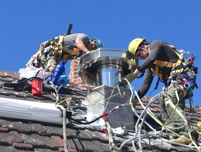 Protective chimney cap installed by Miami Chimney Sweep in Miami, FL