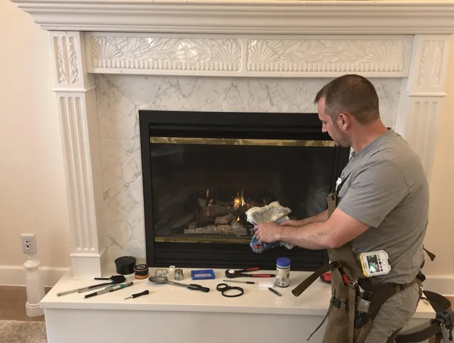 Miami Chimney Sweep performing fireplace maintenance in Miami, FL